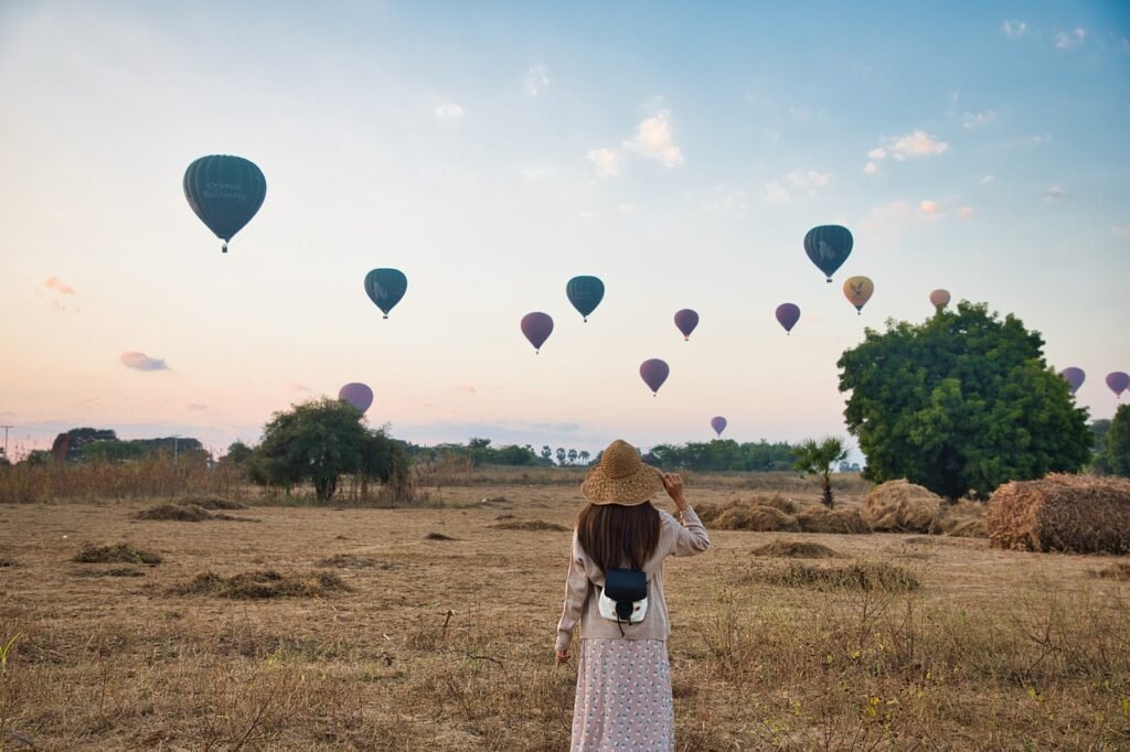 woman, field, hot air balloons-5628426.jpg